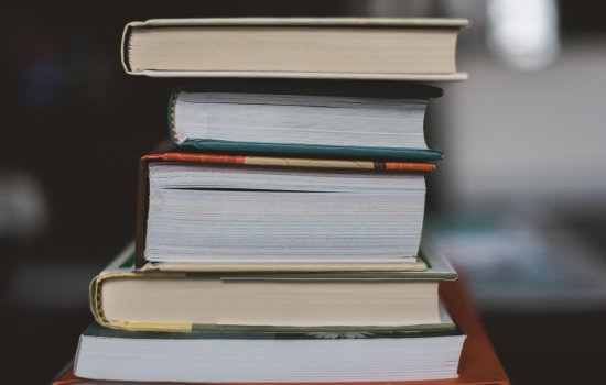 5 books stacked on top of eachother