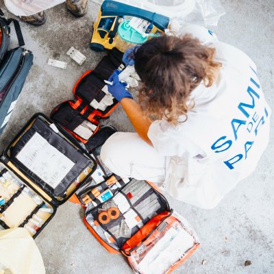 A paramedic with emergency kit.