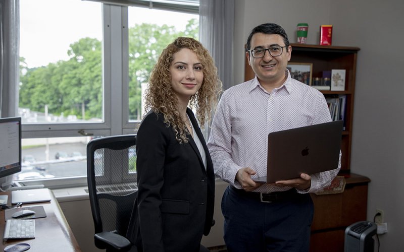 Shaghayegh Sahebi, left, and Reza Feyzi-Behnagh are using a new NSF grant to detect procrastination in online learners and find ways to improve these learners' self-regulation.