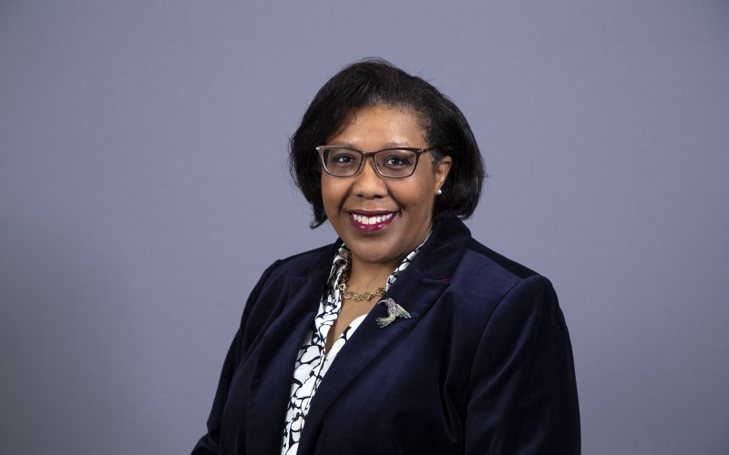 Julia Hastings smiles at the camera.