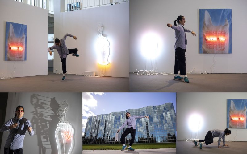 Five images show a dancer in a shirt, tie, cropped pants and sneakers in various poses near neon artwork and outside a glass building