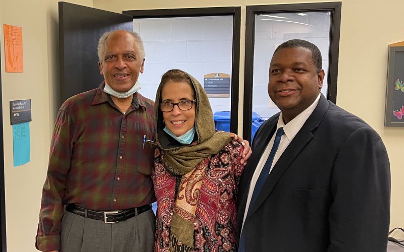 Dr. Harry Hamilton poses for a photo with outgoing EOP Director Maritza Martinez and Senior Academic Advisor & EOP Counselor Patrick Romain inside the EOP complex.
