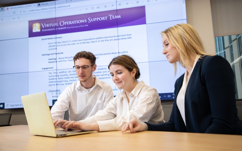 UAlbany VOST students review their social media report for the Texas Division of Emergency Management.