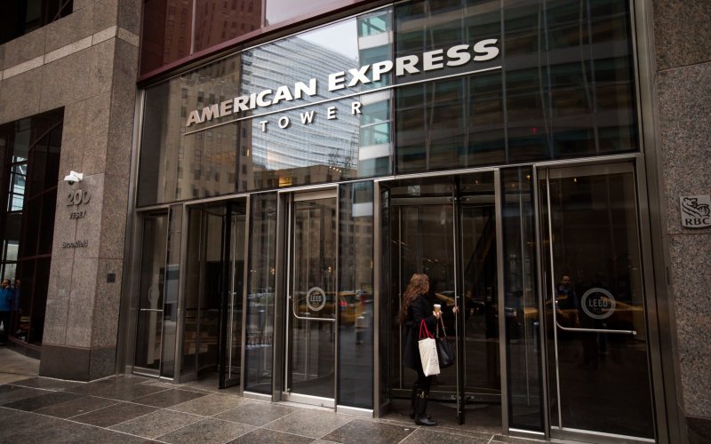A woman enters the American Express headquarters tower in New York City.