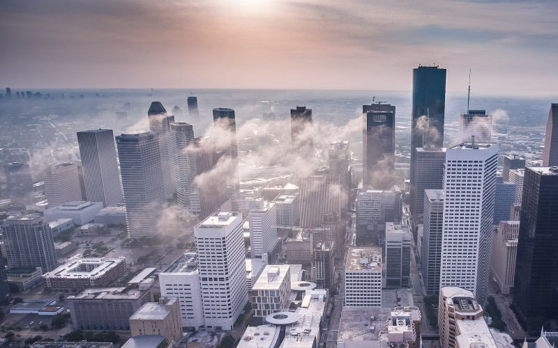 Drone image of downtown Houston, Texas shows a heavy blanket of haze over the city.