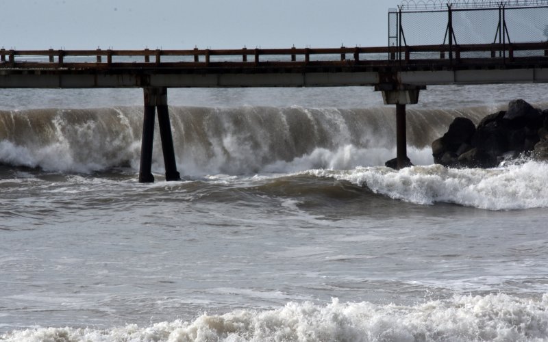 Large storm waves engulf a pier in Ventura County, Calif. 