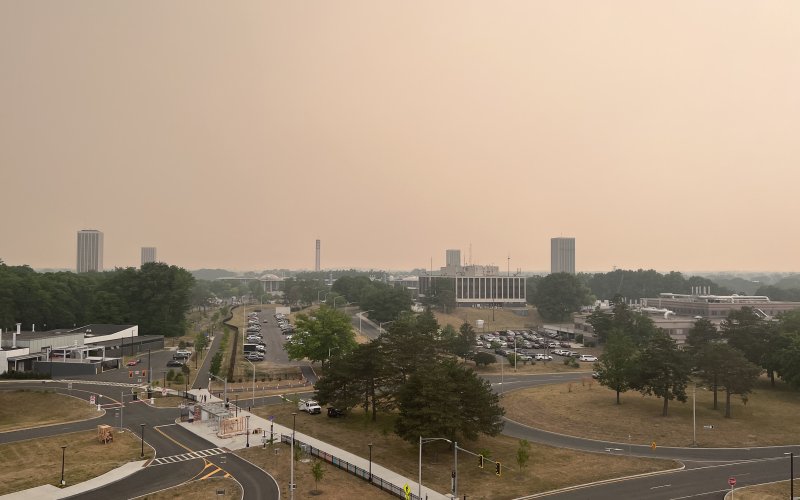 An orange-colored, smoky haze covers the sky above UAlbany's Uptown Campus.