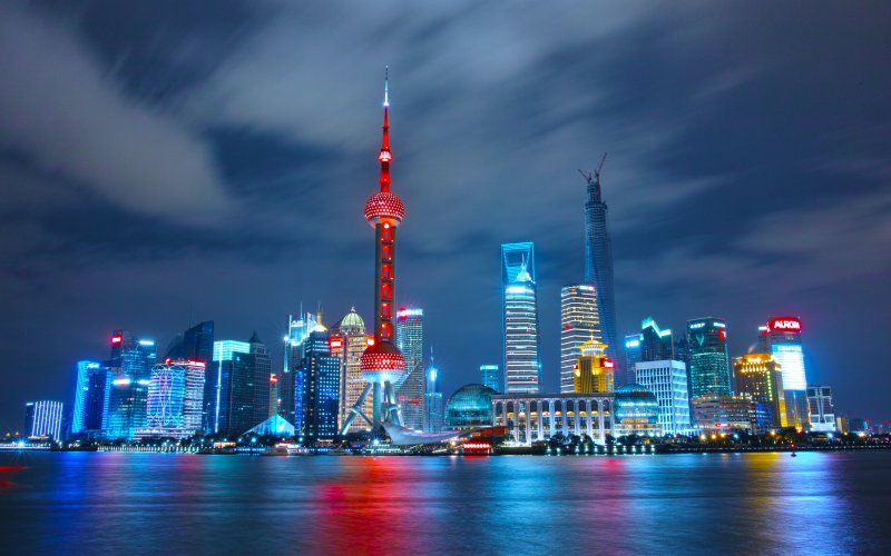 Shanghai China is lit at night.