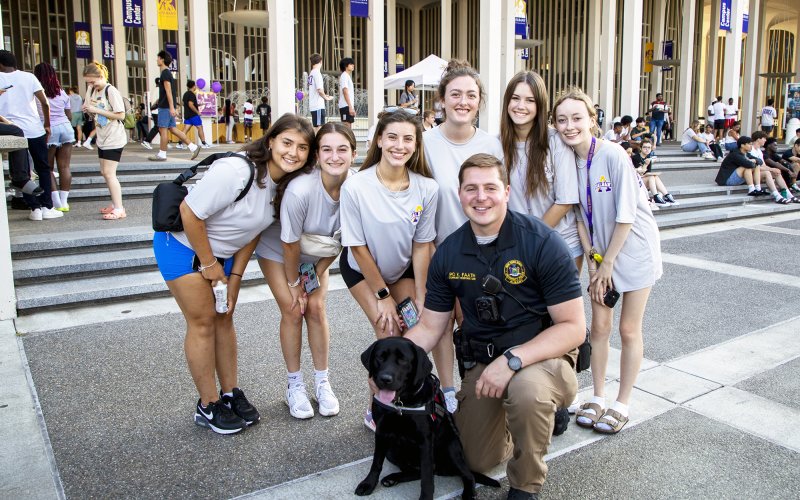 Roxy and UPD Officer Faath attend Convocation festivities to start the 2023 fall semester.