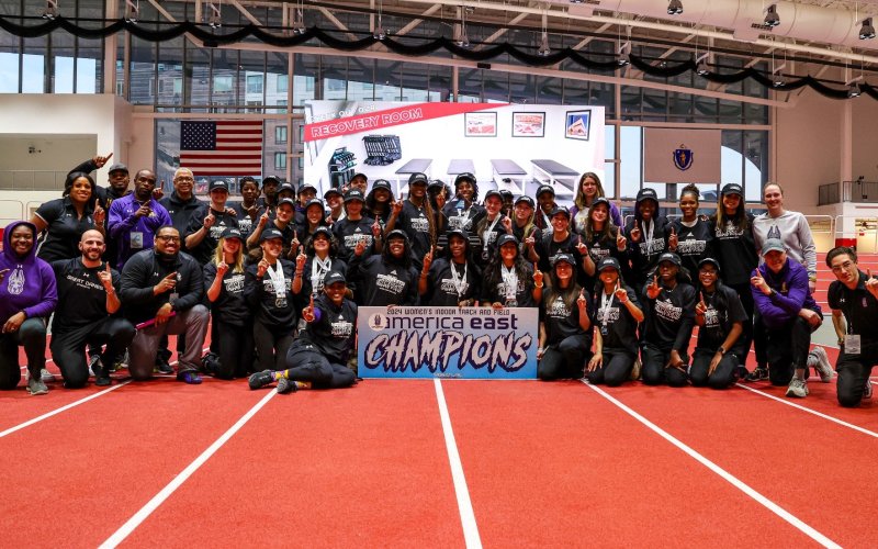 The UAlbany women's indoor track team celebrates their 12th overall title on Tuesday at the America East Championships in Boston.