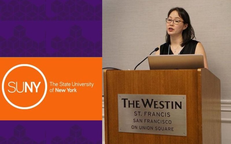 An orange logo reading SUNY The State University of New York and a woman in glasses standing behind a podium with a plaque that says The Westin St. Francis San Fransisco on Union Square