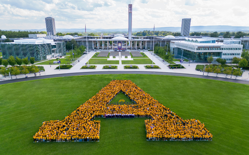 UAlbany Campus and hundreds of students forming the letter A