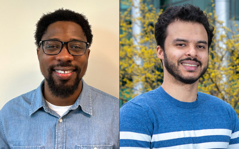  This composite image features two side by side headshots. Emmanuel Edem Adade is at left. Smiling, with a short beard, he is wearing black rectangular-rimmed glasses and a blue denim button down shirt. At right, Jesus Frias smiles in a blue sweater with white stripes. A tree with yellow blossoms is in the background. 