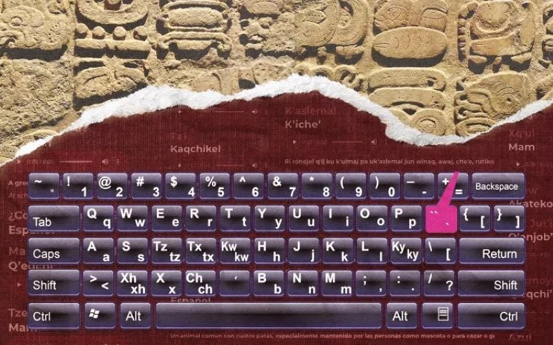 A computer keyboard with Mayan letters included on it.