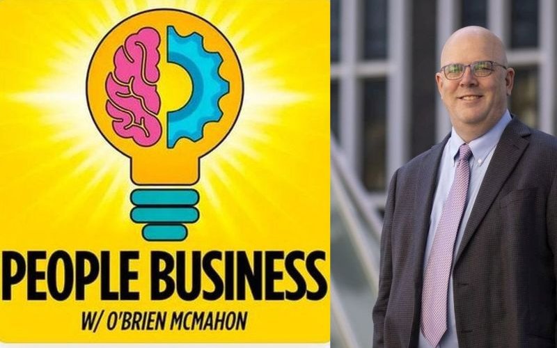 logo with lightbulb and the words "people business with o'brien mcmahon" next to a photo of a bald, smiling man with glasses and a pink tie