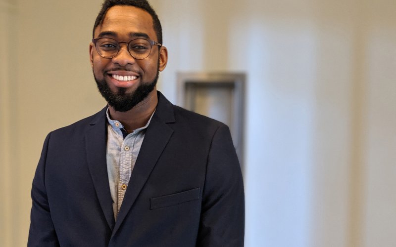 Chris Joseph smiles at the camera.