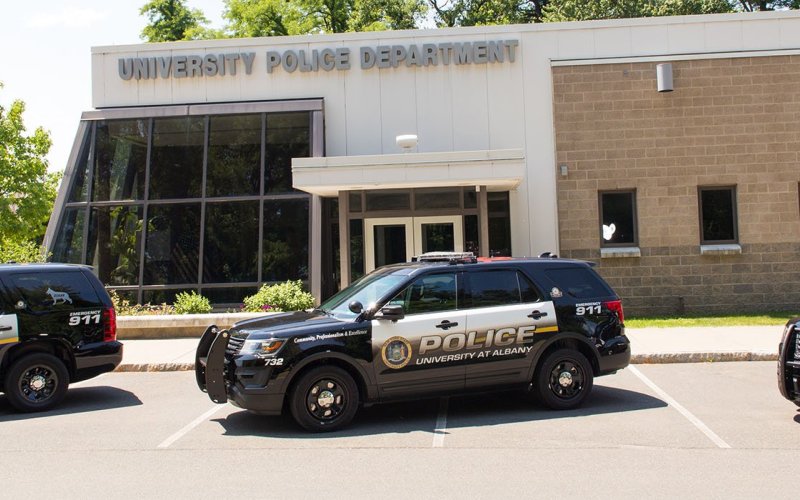 photo of University Police Department station with vehicles