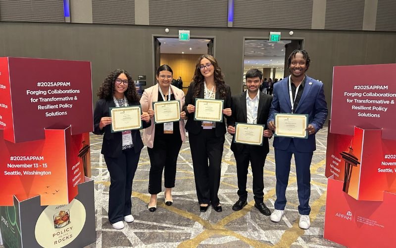 Akhenaton Lazarre, on the far right, poses with fellow students at the APPAM conference.