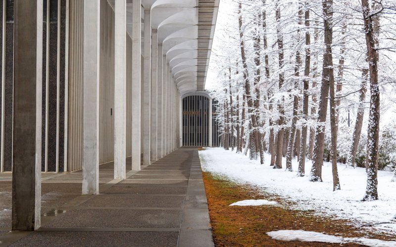 A snowy day outside an academic building on UAlbany's Uptown Campus.