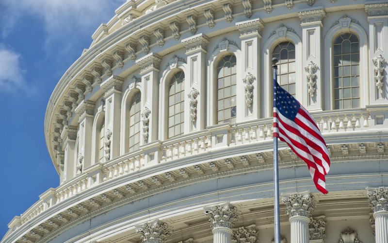 An American Flag waves outside U.S. Capitol Building 