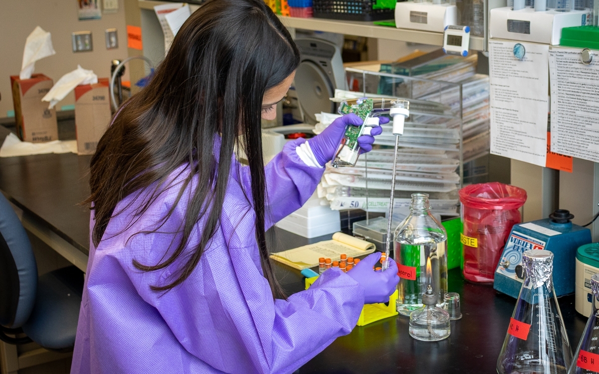 Student working in lab.