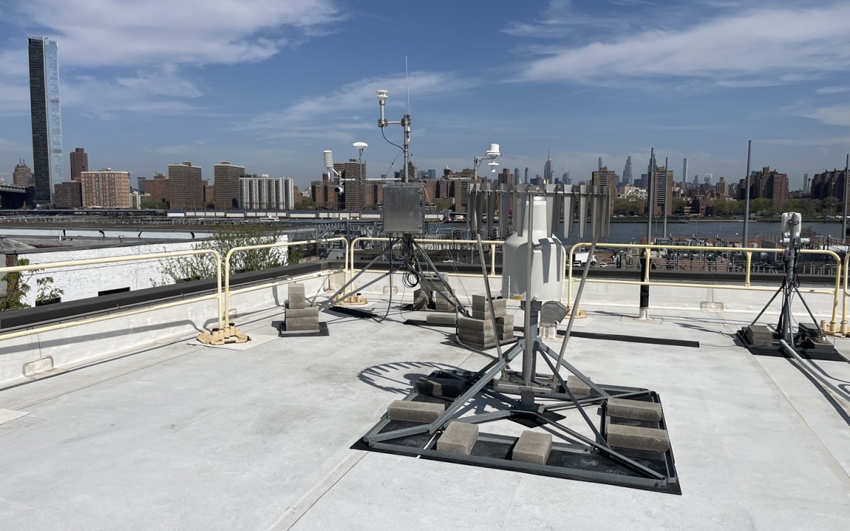 A Mesonet site with the New York City skyline behind it.