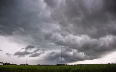 Photo of dark clouds with potential to form a tornado.