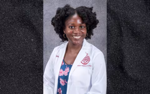 Oyenike Ilaka smiles at the camera. 