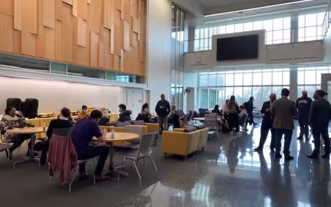 CEHC Dean Robert Griffin and students gather inside ETEC to celebrate Dean's List Honorees