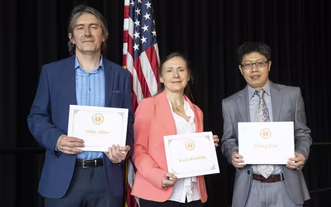 Left to right: Antun Milas, Karin Reinhold and Yiming Ying