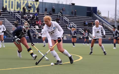 UAlbany field hockey start Alison Smisdom moves the ball against Penn State in the NCAA Quarterfinals at the University of Michigan.