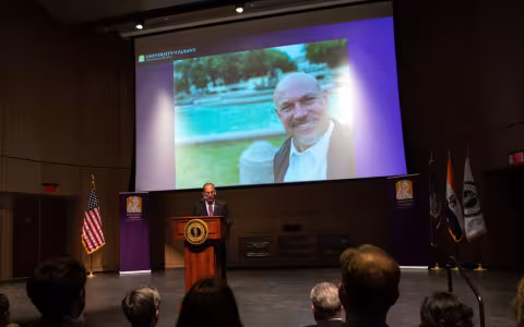 President Rodríguez announces the launch of the Institute for Social and Health Equity at the Spring Address in the Campus Center auditorium.