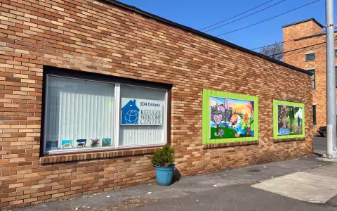 The West Hill Refugee Welcome Center brick building.