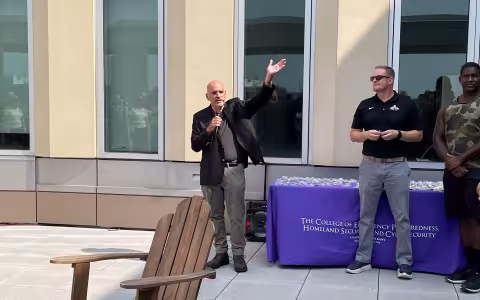 Dean Robert Griffin makes a speech at the Sundaes on Sunday event