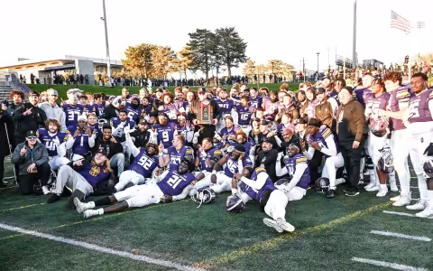 The UAlbany football team celebrates its first CAA football title on Saturday, Nov. 18.