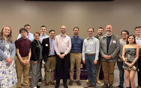 UAlbany students pose alongside the faculty members they have nominated for the 2024 Spark and Torch Awards.