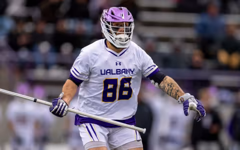 UAlbany longstick defenseman Jake Piseno on the field at Tom and Mary Casey Stadium.