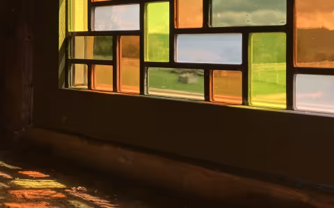 One of three site-specific stained-glass windows created by artist Melissa Thorne. The window is created with hundreds of rectangle shaped pieces of stained glass.