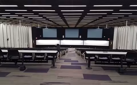 A renovated lecture center from the top of the stairs.