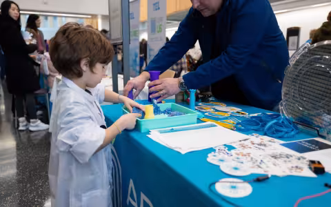 A young student show conducts an experiment inside of the ETEC research and development complex.