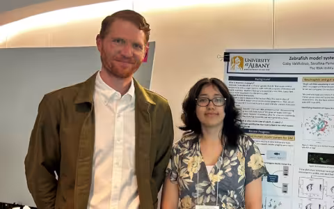 Gaby Valdeivieso and Dr. Farnsworth at Biological Symposium
