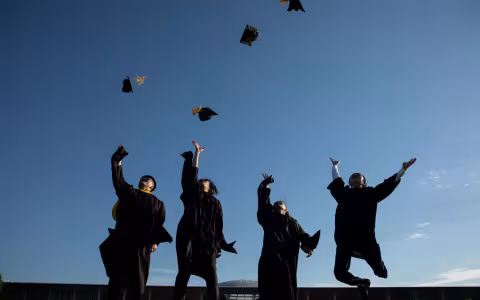 UAlbany students celebrating their graduation