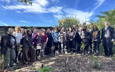 Climate adaptation practitioners and students take a group photo at the Radix Center in Albany.