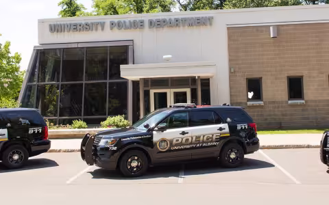 photo of University Police Department station with vehicles