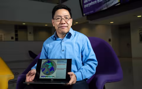 Aiguo Dai shares a graphic of his latest research at University Hall.
