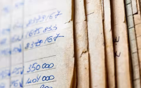 Archived papers stacked together. 