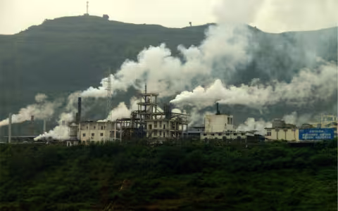 Smoke rises from a factory in China at the Yangtze River.