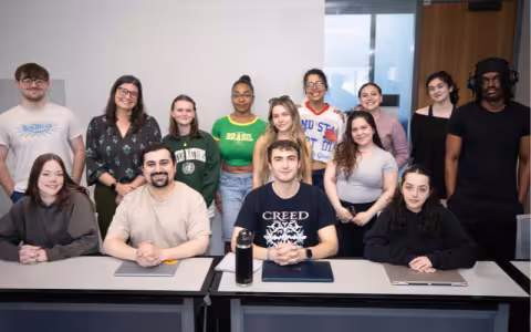 Students in the Nonprofit Organizations, Private Philanthropy, and Solving Public Problems course pose in the classroom. 