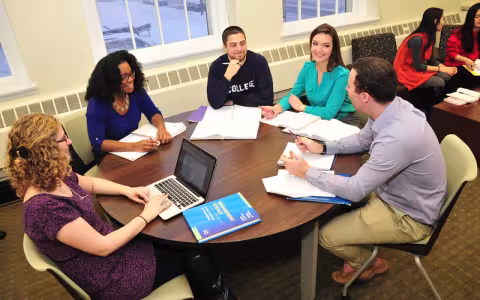 group of people working at table