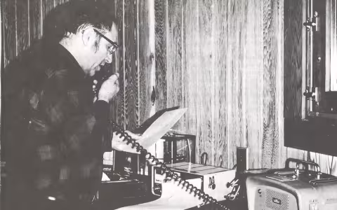 Ray Falconer gives his radio weather forecast from inside the Whiteface Mountain Field Station.